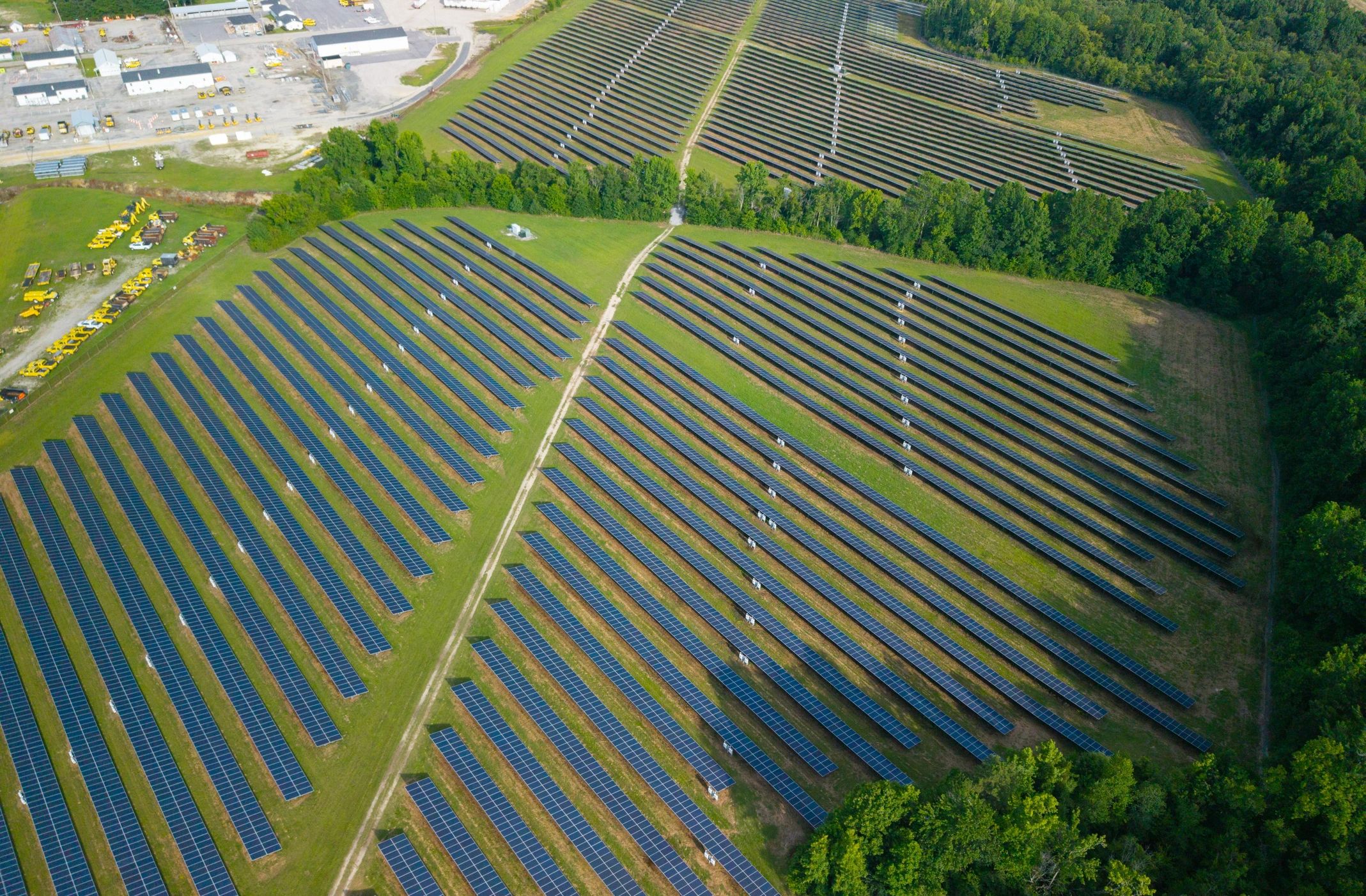 Wide shot of solar panels in a field