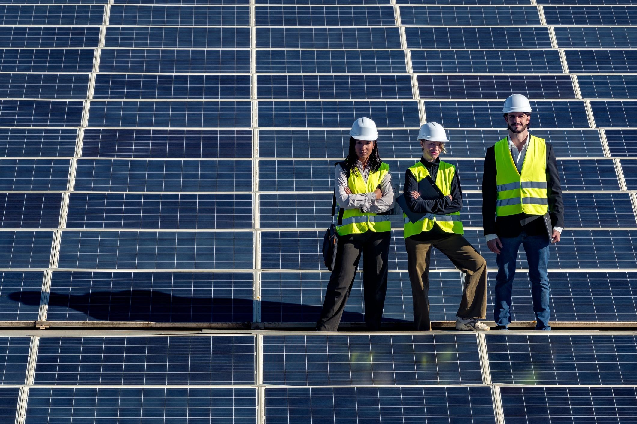 Solar engineers collaborating on a renewable energy project